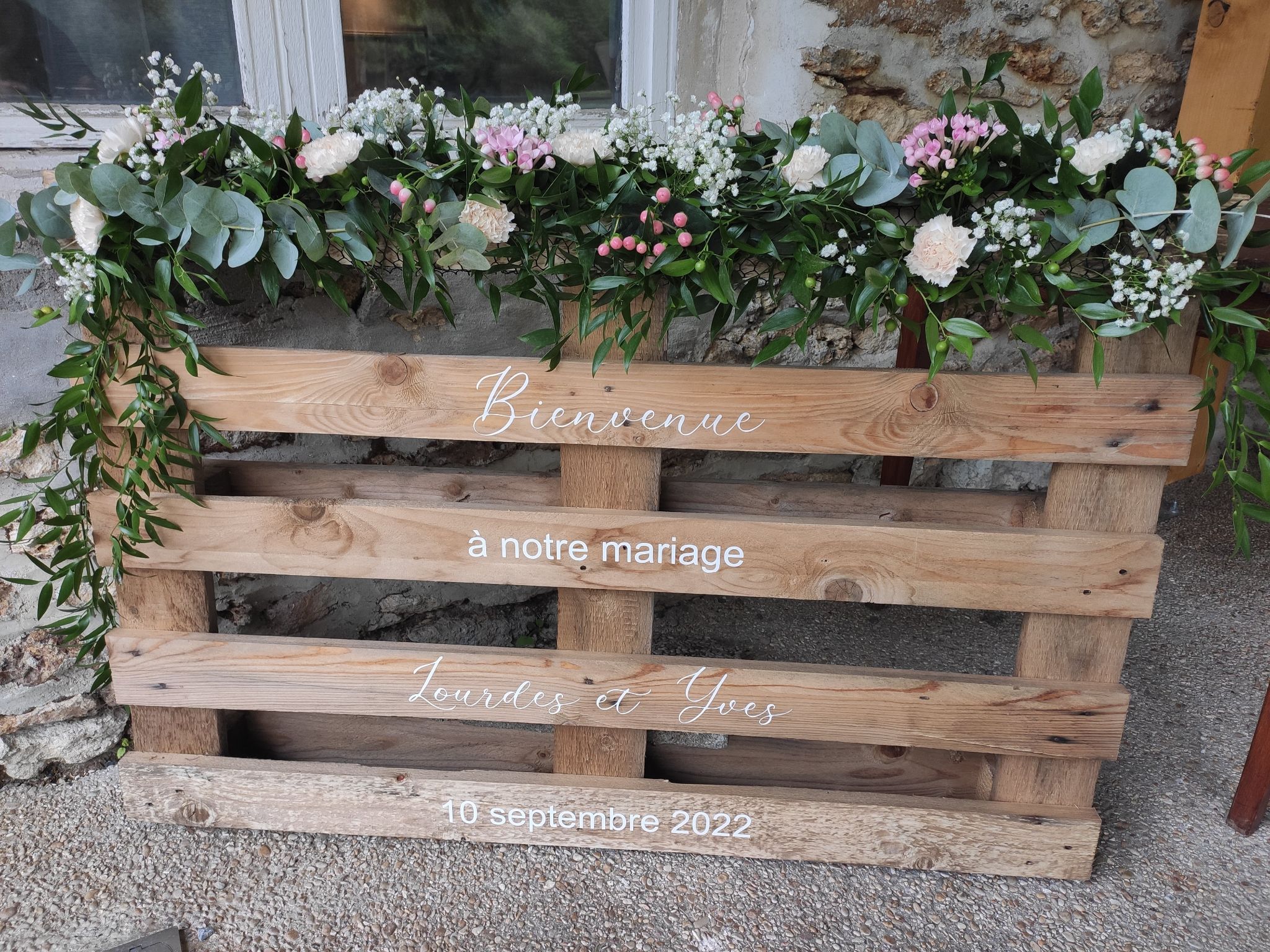 Mariage champetre palette bienvenue fleurs